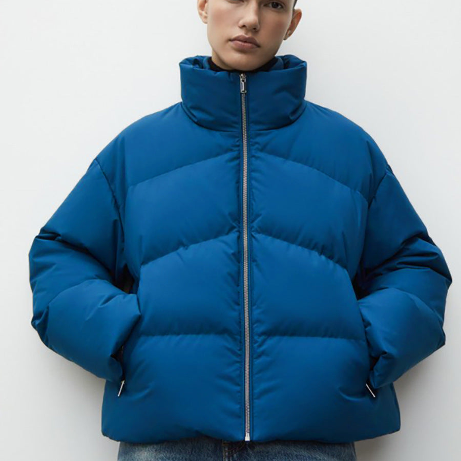 Doudoune blanche à col montant zippée