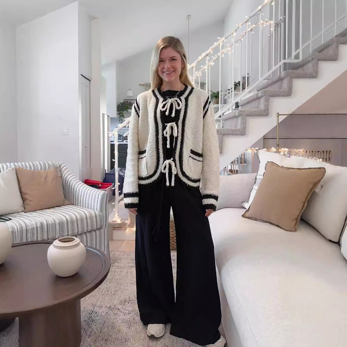 Pull manteau à poches et lacets