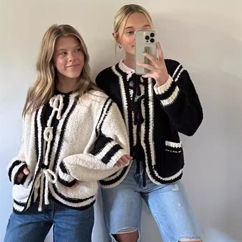 Pull manteau à poches et lacets