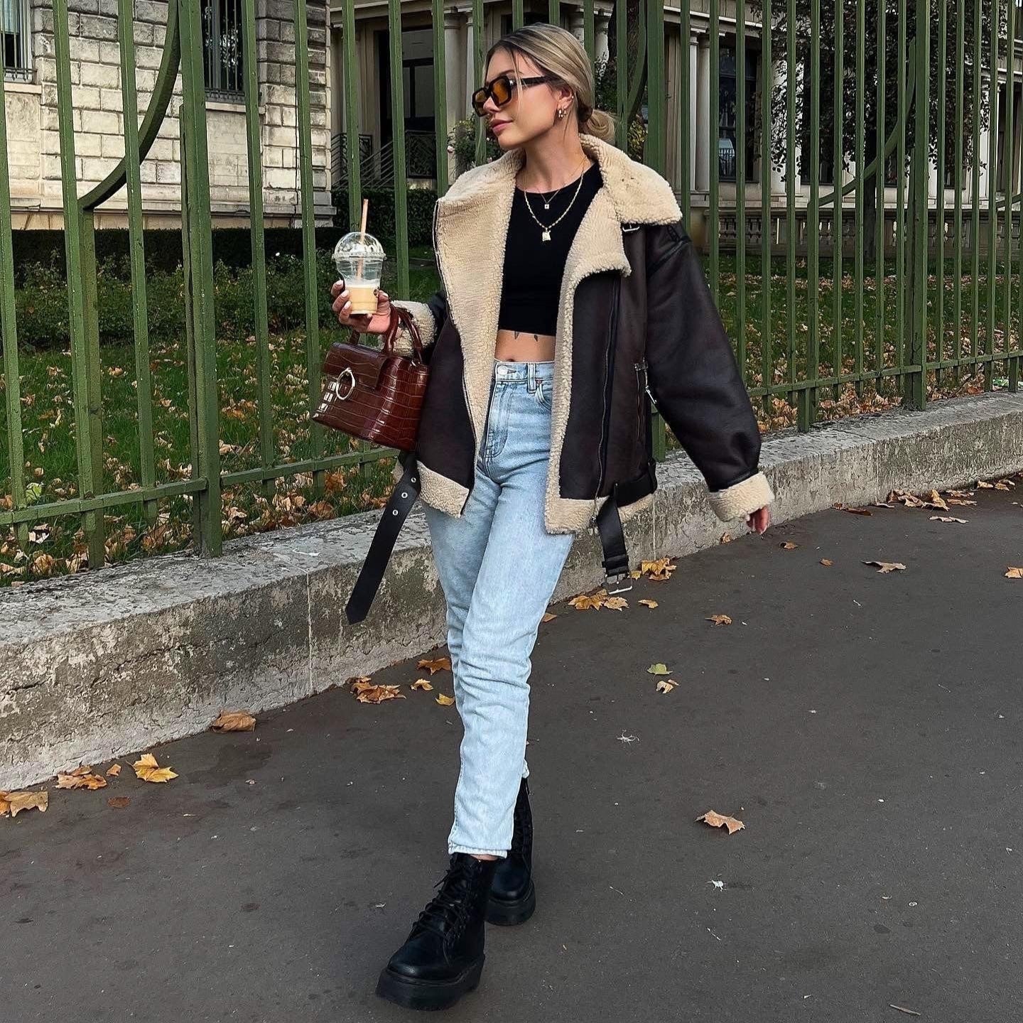 Veste longue en fourrure à multiples zips