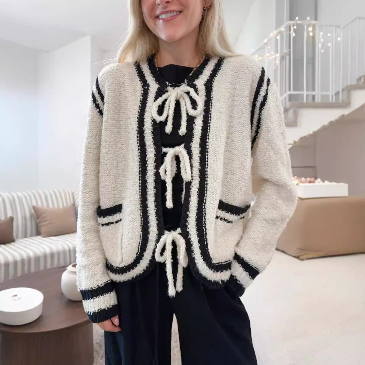 Pull manteau à poches et lacets